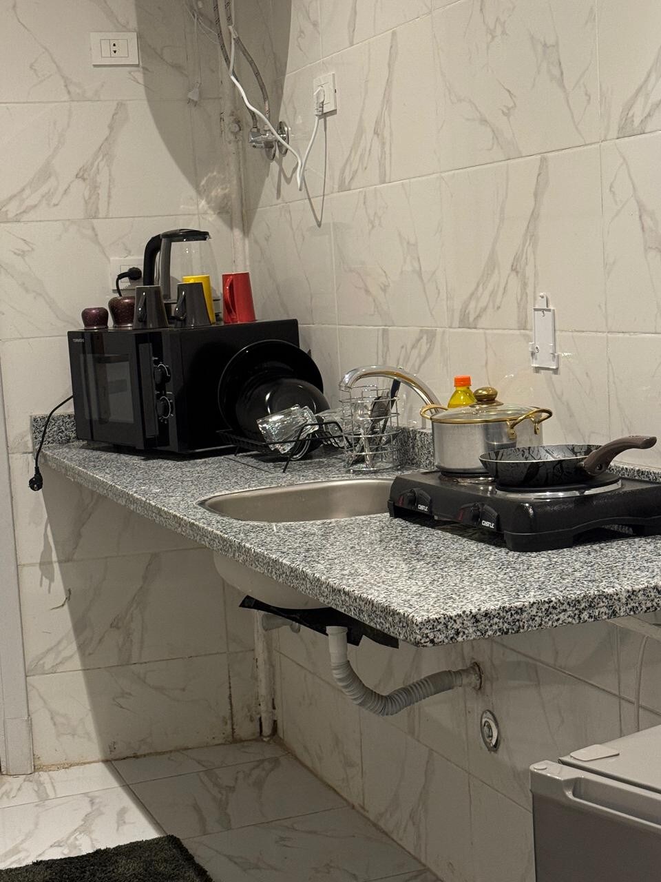 Kitchenette — stove and counter run